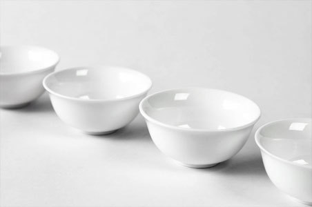 white porcelain tea cup